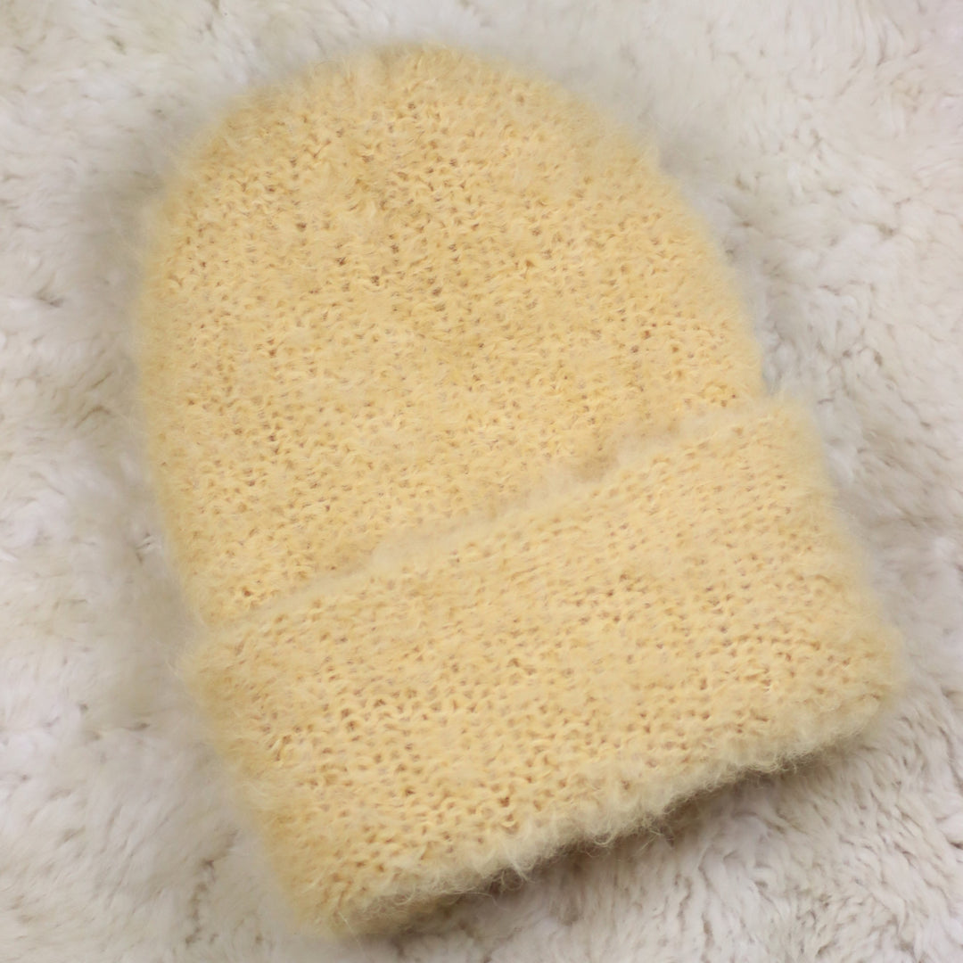 Käännettävä reunainen karvainen pipo - Puffy