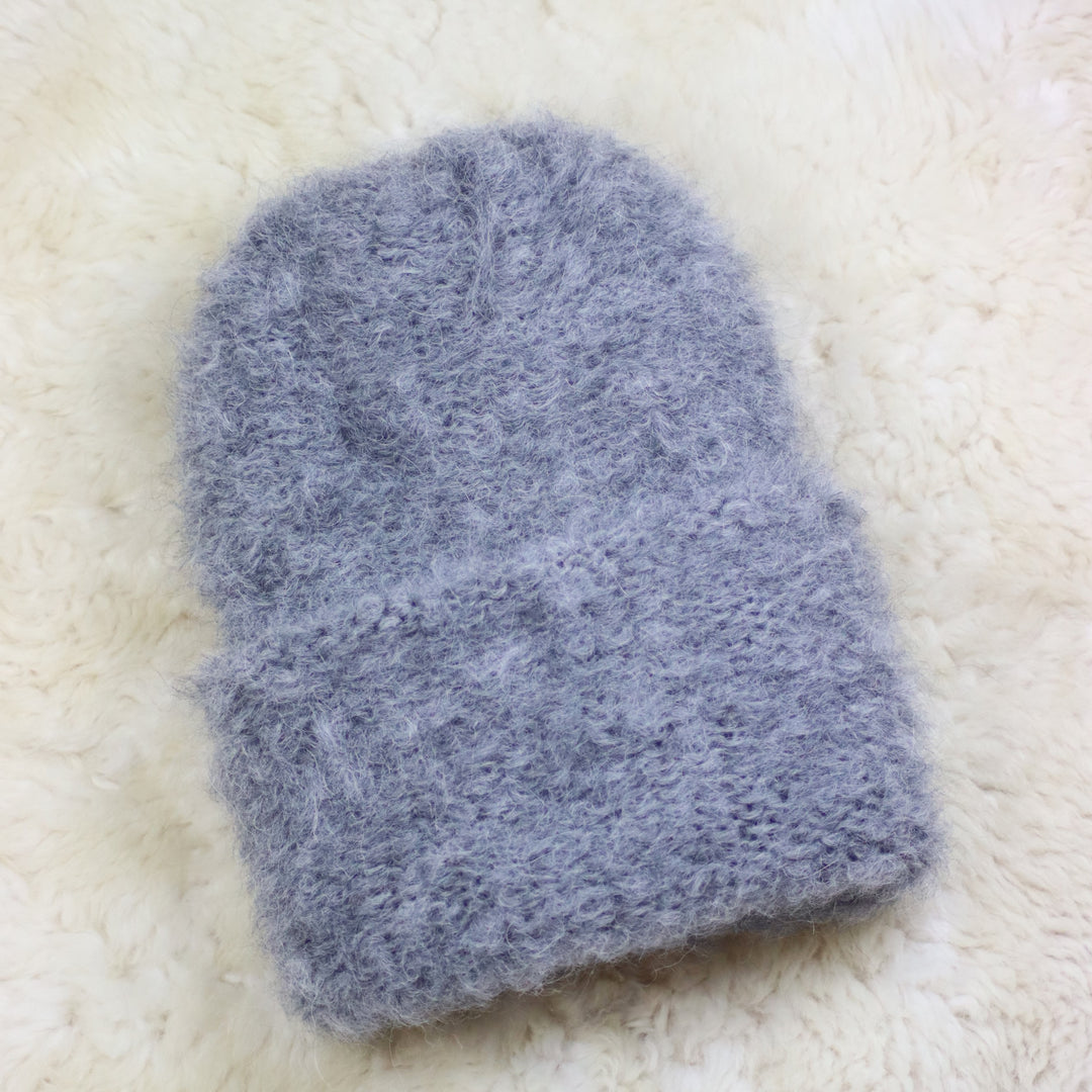 Käännettävä reunainen karvainen pipo - Puffy