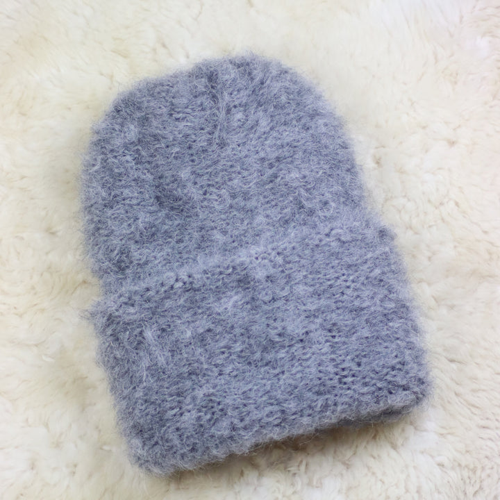 Käännettävä reunainen karvainen pipo - Puffy