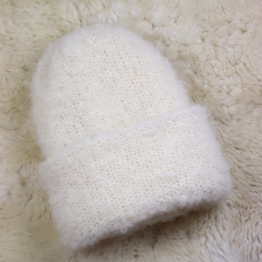 Käännettävä reunainen karvainen pipo - Puffy
