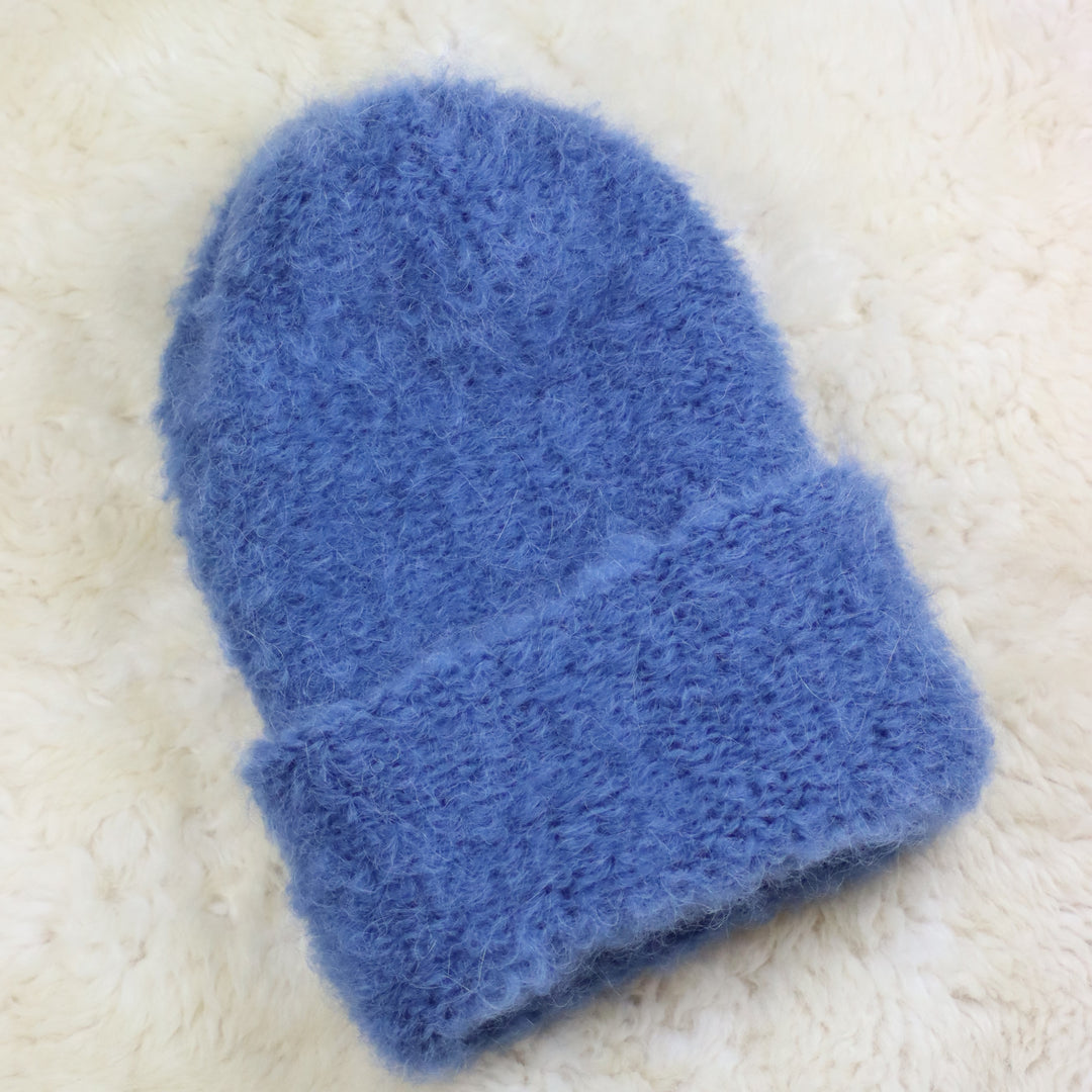Käännettävä reunainen karvainen pipo - Puffy