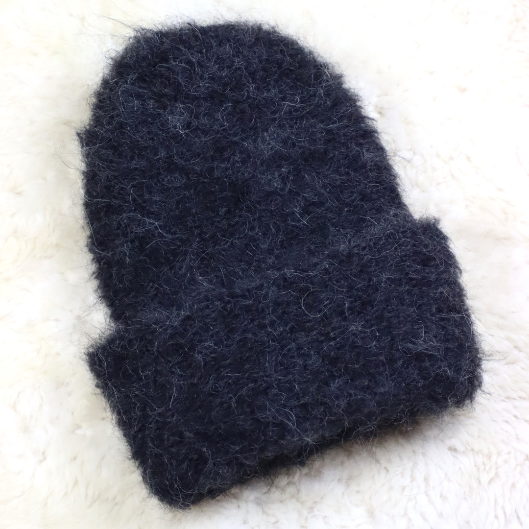 Käännettävä reunainen karvainen pipo - Puffy