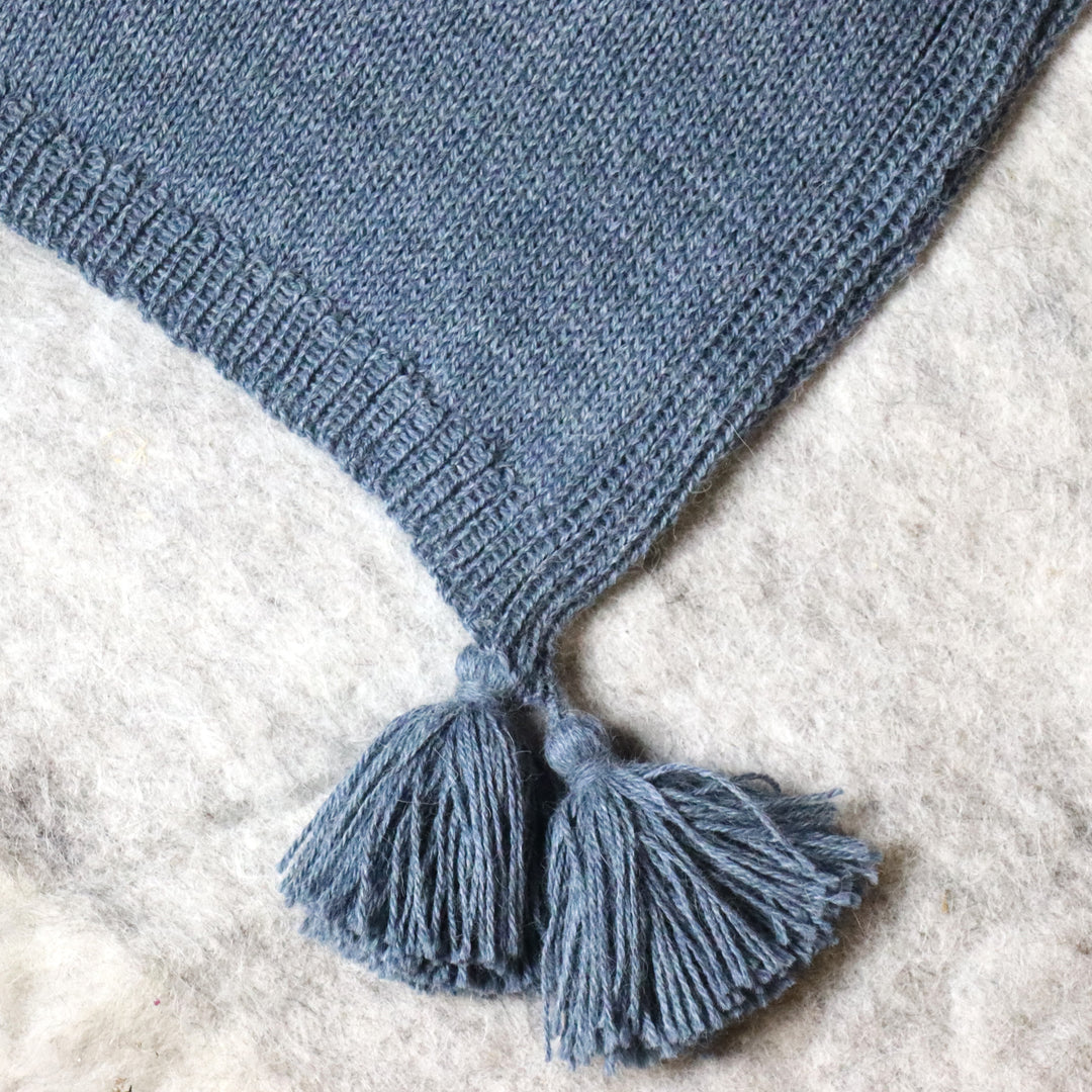 Kaksi yhdessä: poncho-huivi