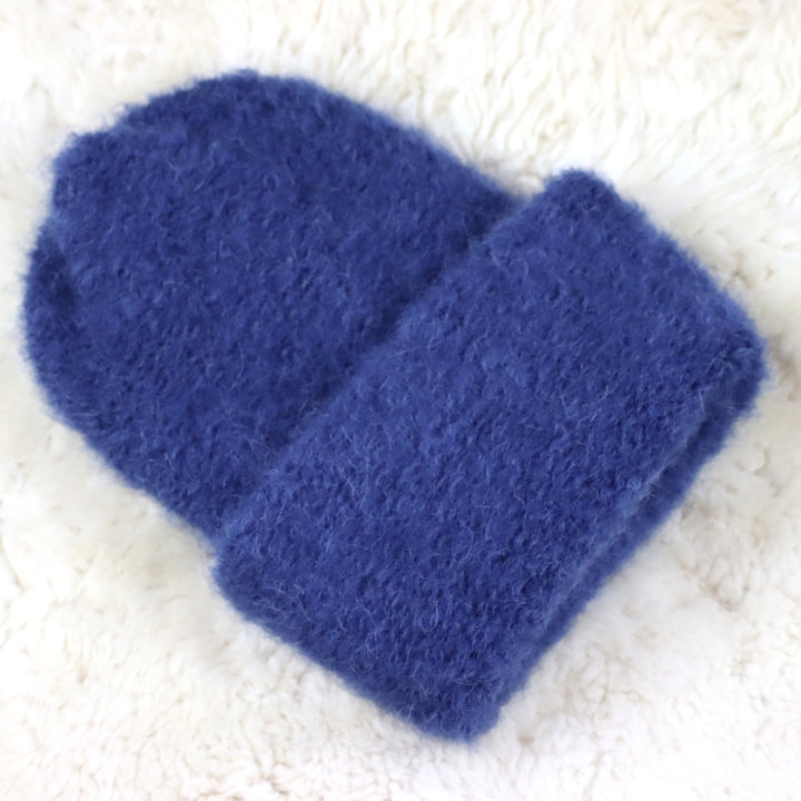 Käännettävä reunainen karvainen pipo - Puffy