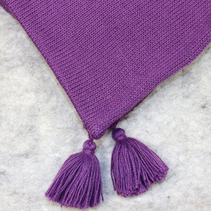 Kaksi yhdessä: poncho-huivi